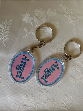 TWO - Teacher's Pet & Angel Oval reversible Keychains